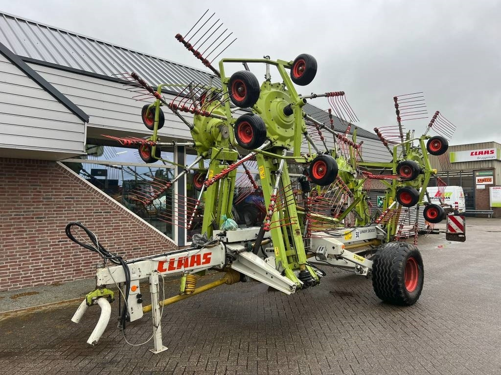 Claas Liner 3000 - Šieno grėblys/ Vartytuvas: foto 1 Claas Liner 3000 - Šieno grėblys/ Vartytuvas: foto 1