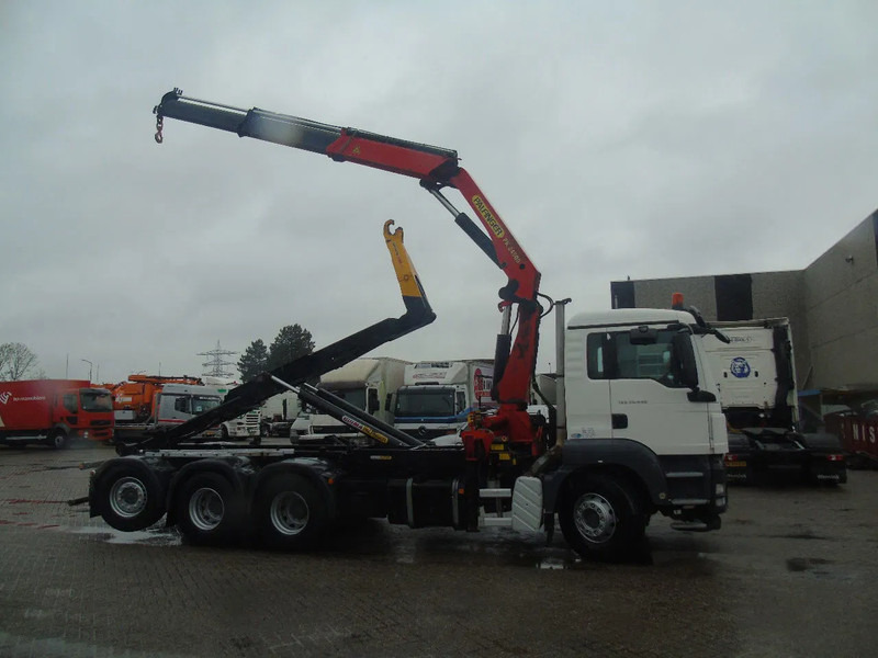 MAN TGS 35.440 + PALFINGER 24500 + 8X4 + EURO 5 + REMOTE - Hook-lift sunkvežimis, Sunkvežimis su kranu: foto 4 MAN TGS 35.440 + PALFINGER 24500 + 8X4 + EURO 5 + REMOTE - Hook-lift sunkvežimis, Sunkvežimis su kranu: foto 4
