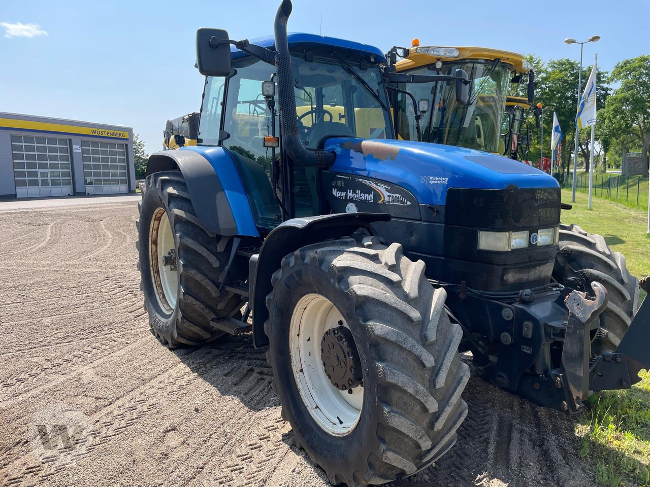 New Holland TM 190 - Traktorius: foto 4 New Holland TM 190 - Traktorius: foto 4