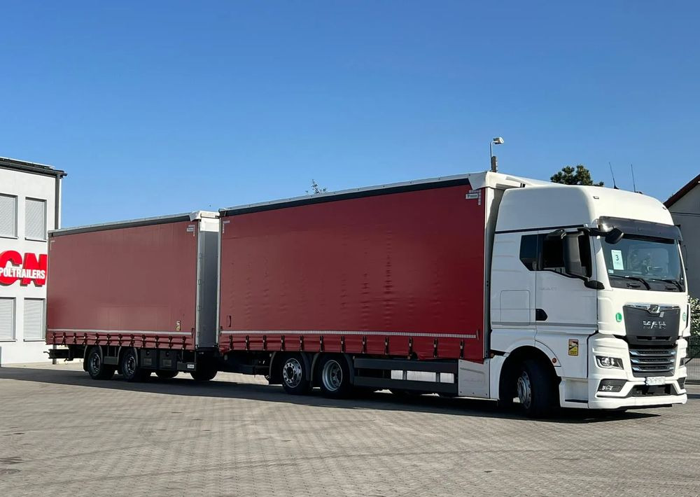 MAN TGX 26.470 z przyczepą Redos - Tentinis sunkvežimis: foto 2 MAN TGX 26.470 z przyczepą Redos - Tentinis sunkvežimis: foto 2
