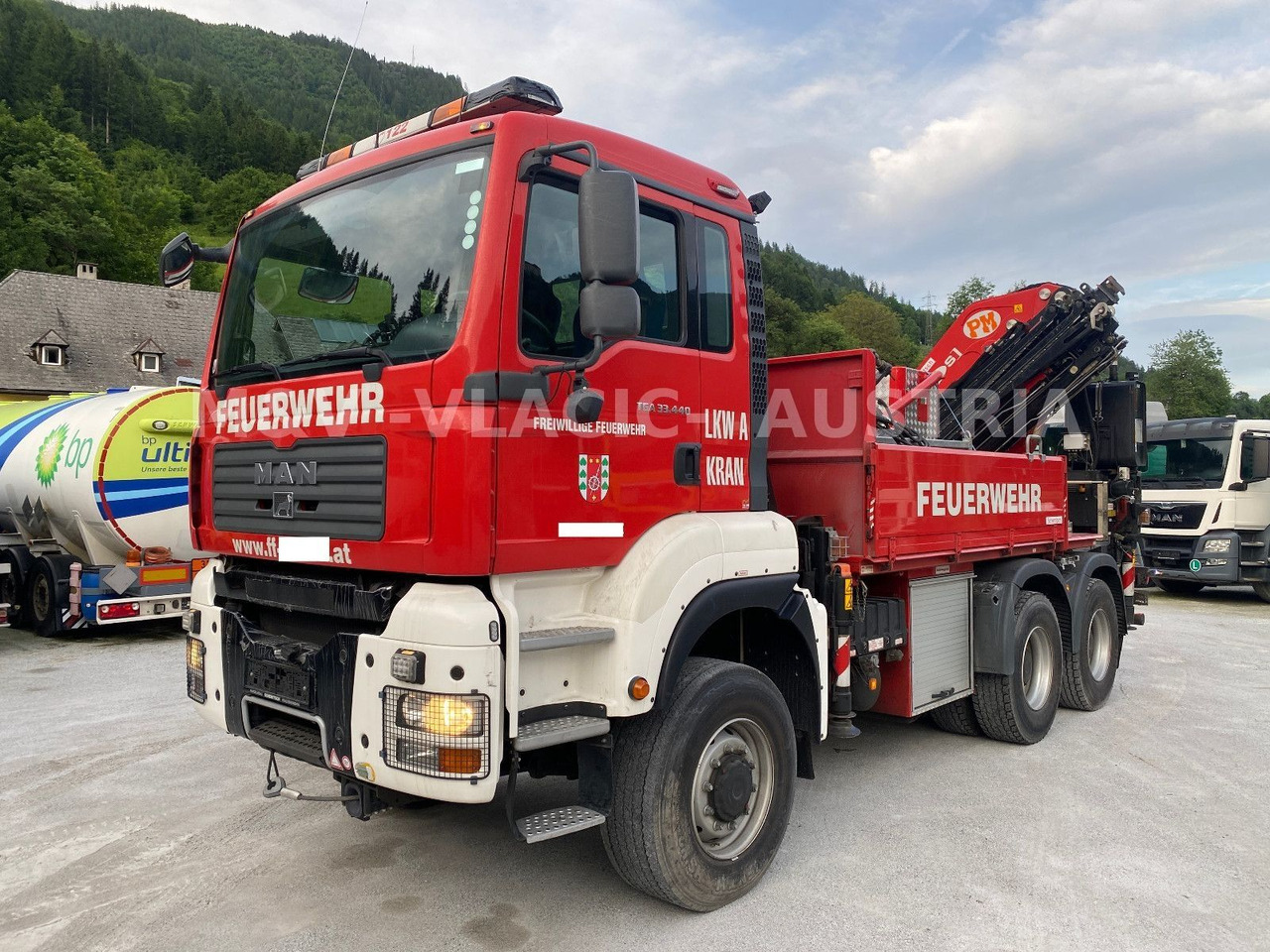 MAN 33.440 6x6 KRAN PM27 und Frontseilwinde 60lm - Platforminis/ Bortinis sunkvežimis, Sunkvežimis su kranu: foto 1 MAN 33.440 6x6 KRAN PM27 und Frontseilwinde 60lm - Platforminis/ Bortinis sunkvežimis, Sunkvežimis su kranu: foto 1