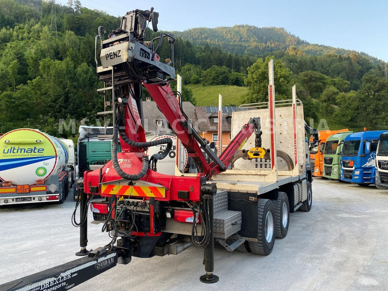 MAN 33.500 6X6 mit Kran PENZ 12Z - Miškovežis, Sunkvežimis su kranu: foto 3 MAN 33.500 6X6 mit Kran PENZ 12Z - Miškovežis, Sunkvežimis su kranu: foto 3