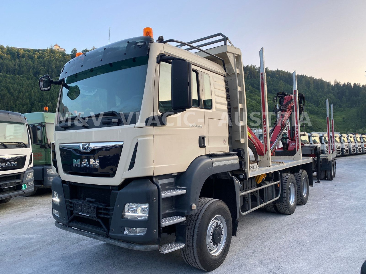 MAN 33.500 6X6 mit Kran PENZ 12Z - Miškovežis, Sunkvežimis su kranu: foto 1 MAN 33.500 6X6 mit Kran PENZ 12Z - Miškovežis, Sunkvežimis su kranu: foto 1