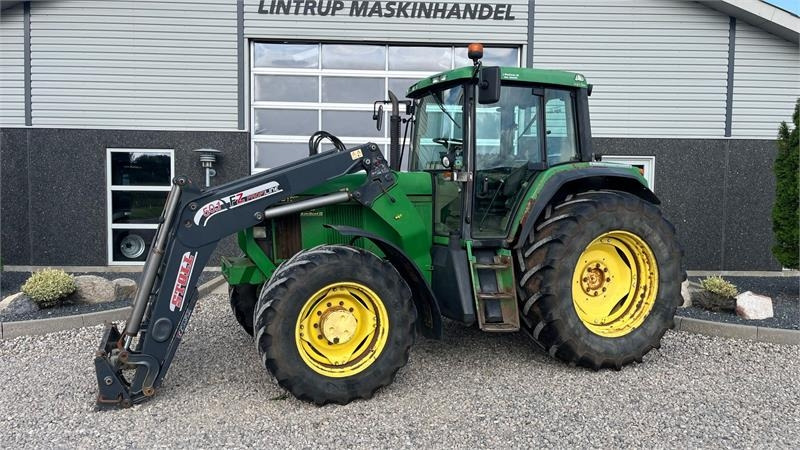 John Deere 6910 Auto Quad II-TLS Med frontlæsser - Traktorius: foto 1 John Deere 6910 Auto Quad II-TLS Med frontlæsser - Traktorius: foto 1