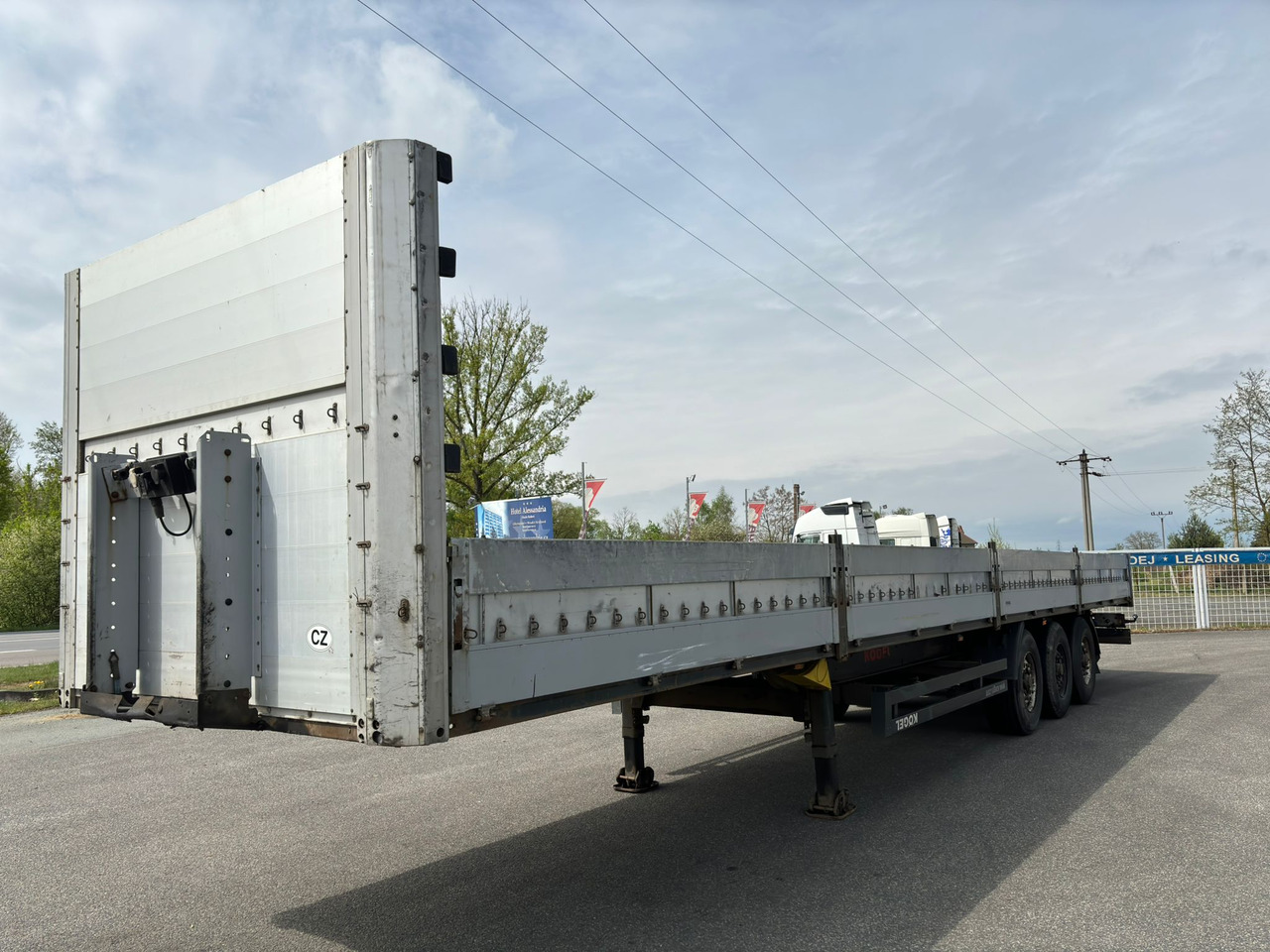 KÖGEL SN 24 - Platforminė/ Bortinė puspriekabė: foto 1 KÖGEL SN 24 - Platforminė/ Bortinė puspriekabė: foto 1
