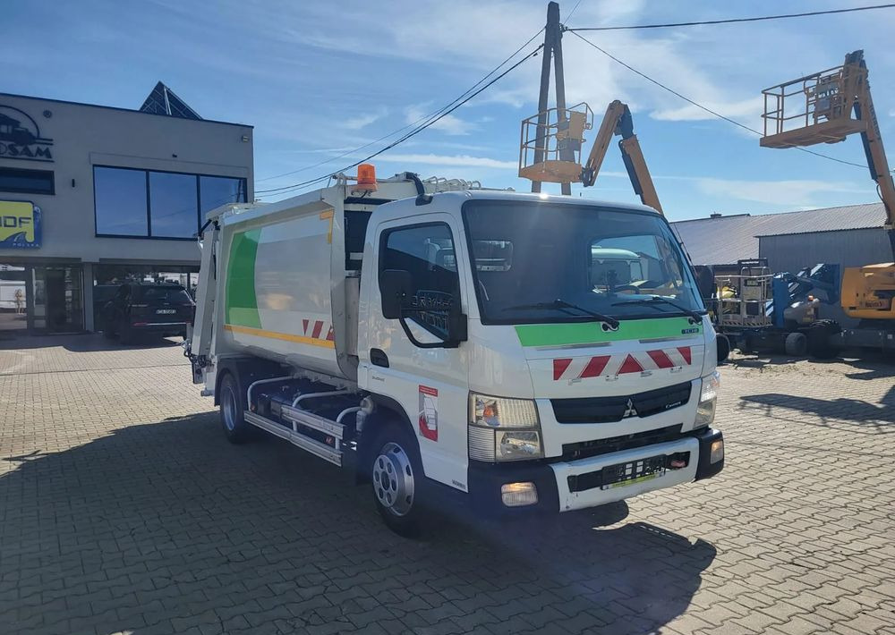 Mitsubishi Fuso Canter - Šiukšliavežis: foto 2 Mitsubishi Fuso Canter - Šiukšliavežis: foto 2