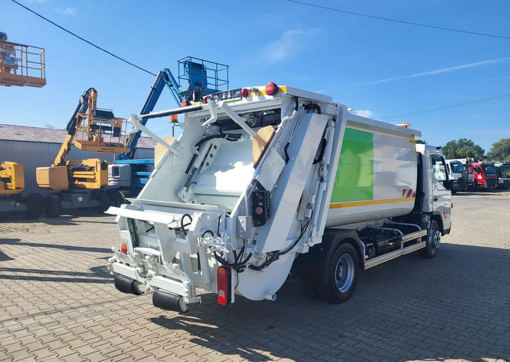 Mitsubishi Fuso Canter - Šiukšliavežis: foto 5 Mitsubishi Fuso Canter - Šiukšliavežis: foto 5