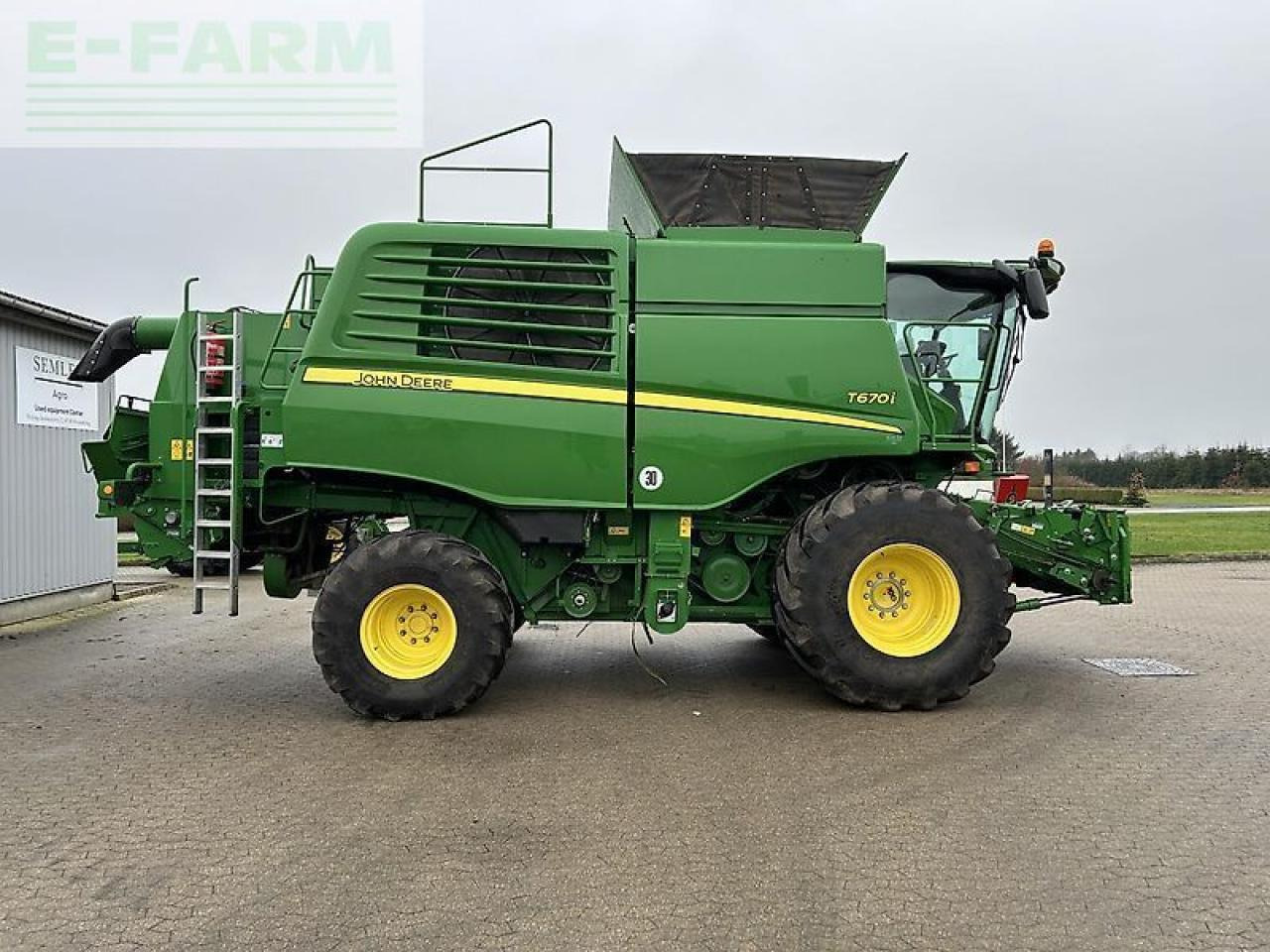 John Deere t670 - Derliaus nuėmimo kombainas: foto 2 John Deere t670 - Derliaus nuėmimo kombainas: foto 2