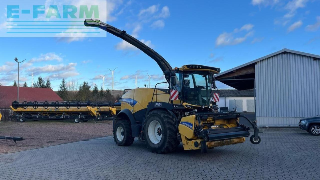 New Holland fr 550 häcksler inkl. pickup und maisgebiss - Pašarų kombainas: foto 1 New Holland fr 550 häcksler inkl. pickup und maisgebiss - Pašarų kombainas: foto 1