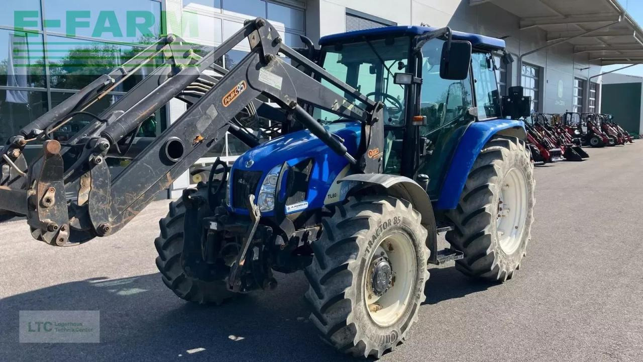 New Holland tl 80 - Traktorius: foto 1 New Holland tl 80 - Traktorius: foto 1
