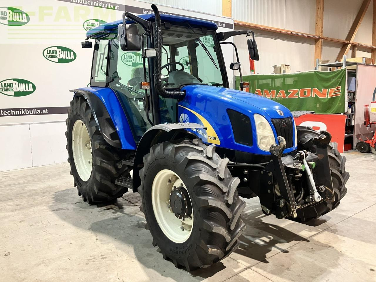 New Holland tl100a (4wd) A - Traktorius: foto 2 New Holland tl100a (4wd) A - Traktorius: foto 2