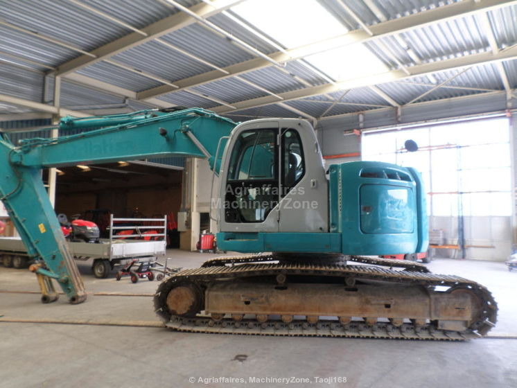 New Holland Kobelco Kobelco E 235 BSR-2 E 235 BSR-2 - Vikšrinis ekskavatorius: foto 1 New Holland Kobelco Kobelco E 235 BSR-2 E 235 BSR-2 - Vikšrinis ekskavatorius: foto 1