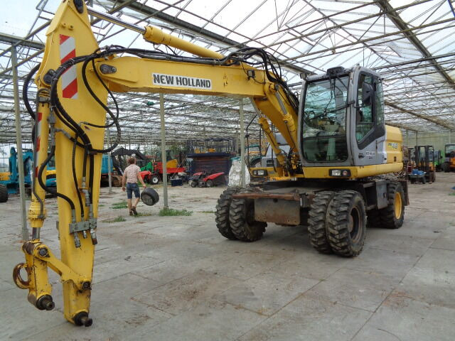New Holland MH 4.6 - Ratinis ekskavatorius: foto 2 New Holland MH 4.6 - Ratinis ekskavatorius: foto 2