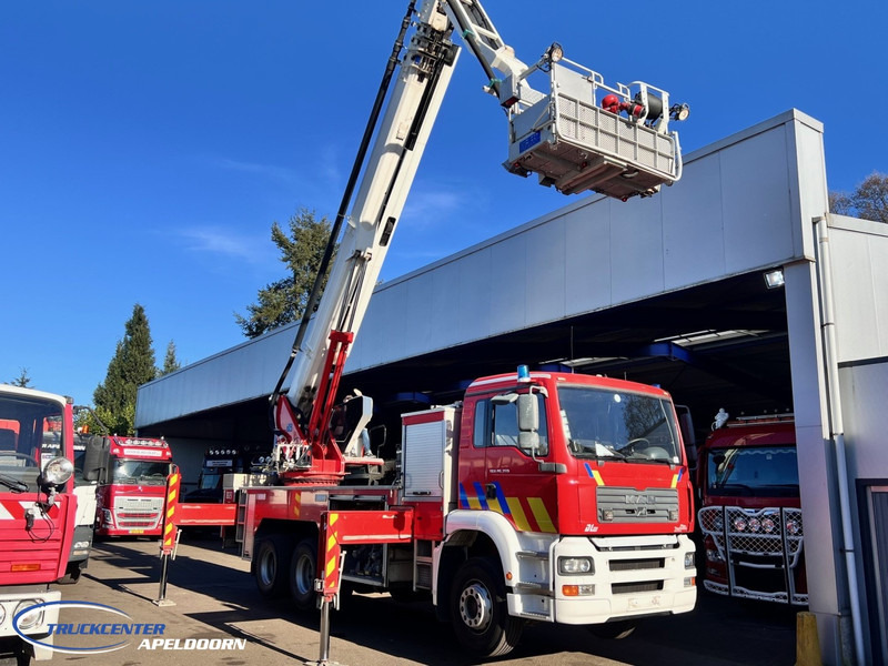 MAN TGA 26.350 Magirus ALP 320L = 32 meter, Waterpomp, 6x4, Bladgeveerd - Gaisrinė mašina: foto 2 MAN TGA 26.350 Magirus ALP 320L = 32 meter, Waterpomp, 6x4, Bladgeveerd - Gaisrinė mašina: foto 2