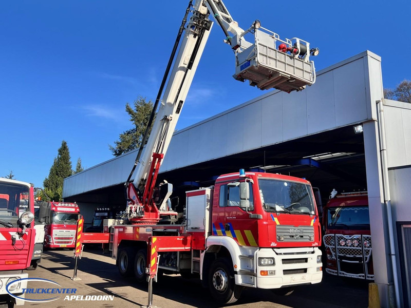 MAN TGA 26.350 Magirus ALP 320L = 32 meter, Waterpump, 6x4, Steel springs - Sunkvežimis: foto 2 MAN TGA 26.350 Magirus ALP 320L = 32 meter, Waterpump, 6x4, Steel springs - Sunkvežimis: foto 2