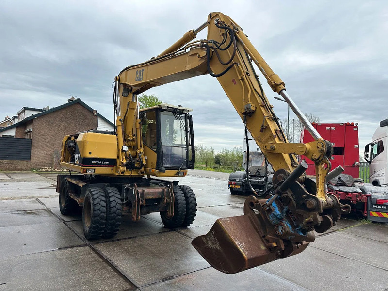 Caterpillar M315 +ROTO CE - Ratinis ekskavatorius: foto 3 Caterpillar M315 +ROTO CE - Ratinis ekskavatorius: foto 3