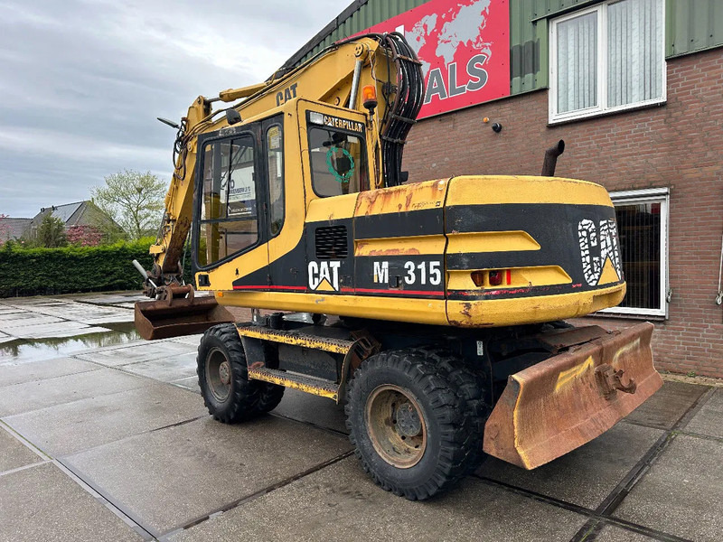 Caterpillar M315 +ROTO CE - Ratinis ekskavatorius: foto 4 Caterpillar M315 +ROTO CE - Ratinis ekskavatorius: foto 4