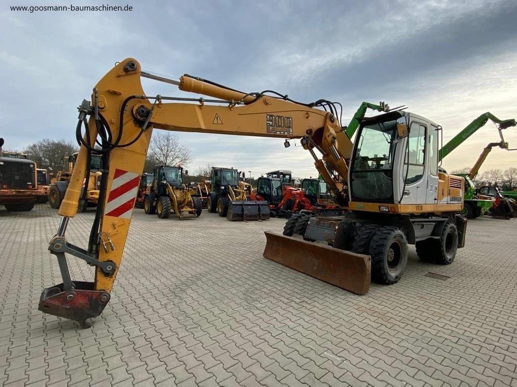 Liebherr A 900 C Litronic - Ratinis ekskavatorius: foto 1 Liebherr A 900 C Litronic - Ratinis ekskavatorius: foto 1