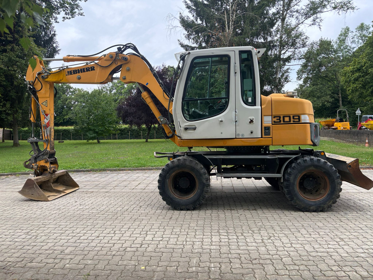 LIEBHERR A 309 Litronic - Ratinis ekskavatorius: foto 1 LIEBHERR A 309 Litronic - Ratinis ekskavatorius: foto 1