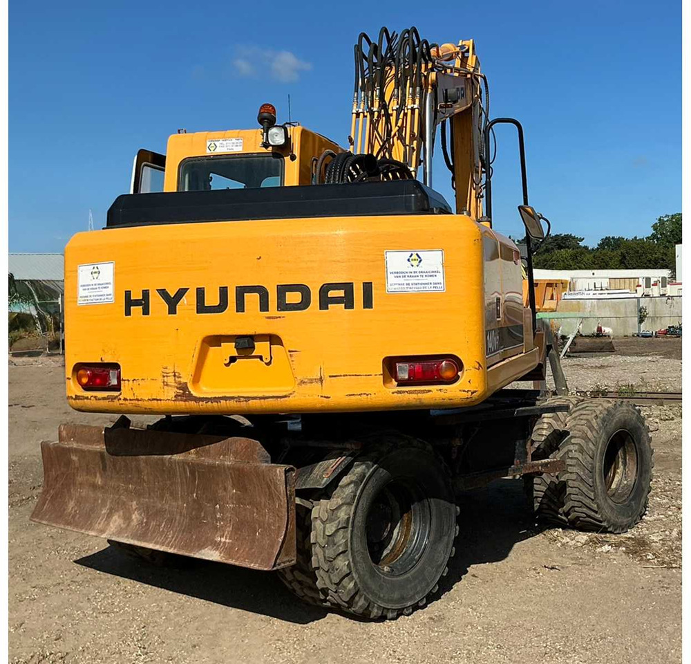 Hyundai Robex140W-7 - Ratinis ekskavatorius: foto 4 Hyundai Robex140W-7 - Ratinis ekskavatorius: foto 4