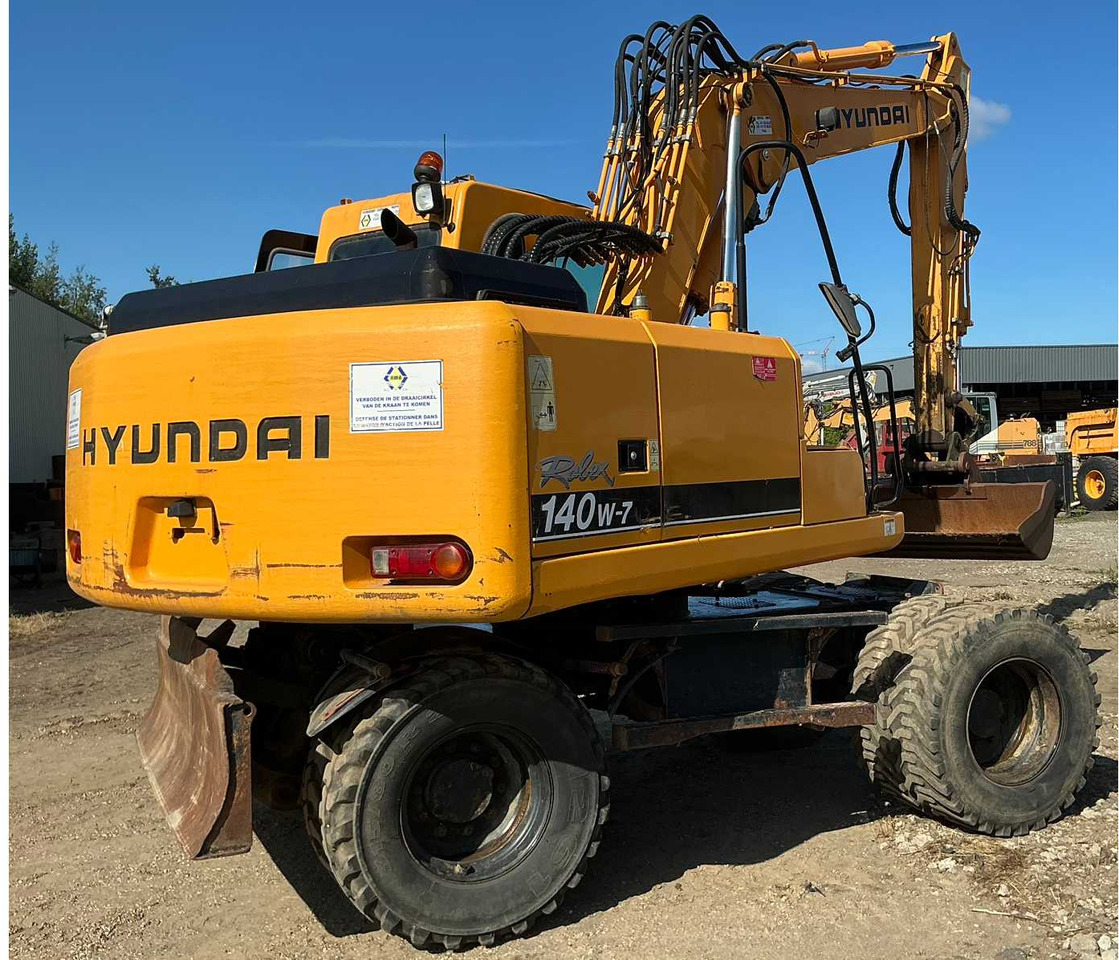 Hyundai Robex140W-7 - Ratinis ekskavatorius: foto 5 Hyundai Robex140W-7 - Ratinis ekskavatorius: foto 5