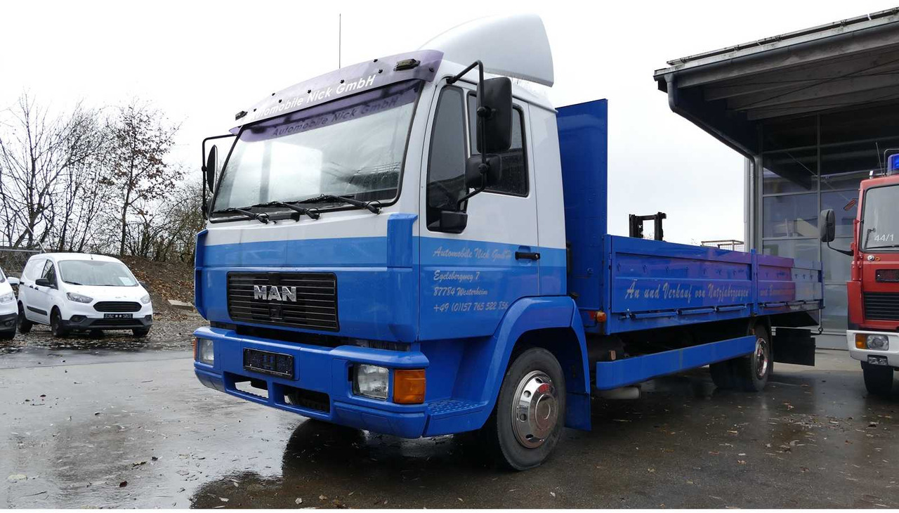 MAN - L 2000 TOW TRUCK - FLATBED - MACHINE TRANSPORTER - 1999 - TRUCKS - Sunkvežimis: foto 1 MAN - L 2000 TOW TRUCK - FLATBED - MACHINE TRANSPORTER - 1999 - TRUCKS - Sunkvežimis: foto 1