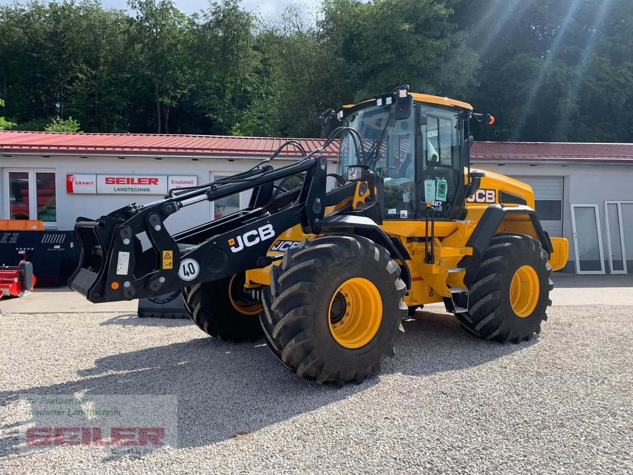 JCB 427 Agri Stage V HighLift - Ratinis krautuvas: foto 1 JCB 427 Agri Stage V HighLift - Ratinis krautuvas: foto 1
