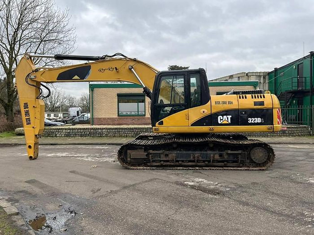 Caterpillar 323DL - 323 DL - 323D - Ekskavatorius: foto 1 Caterpillar 323DL - 323 DL - 323D - Ekskavatorius: foto 1