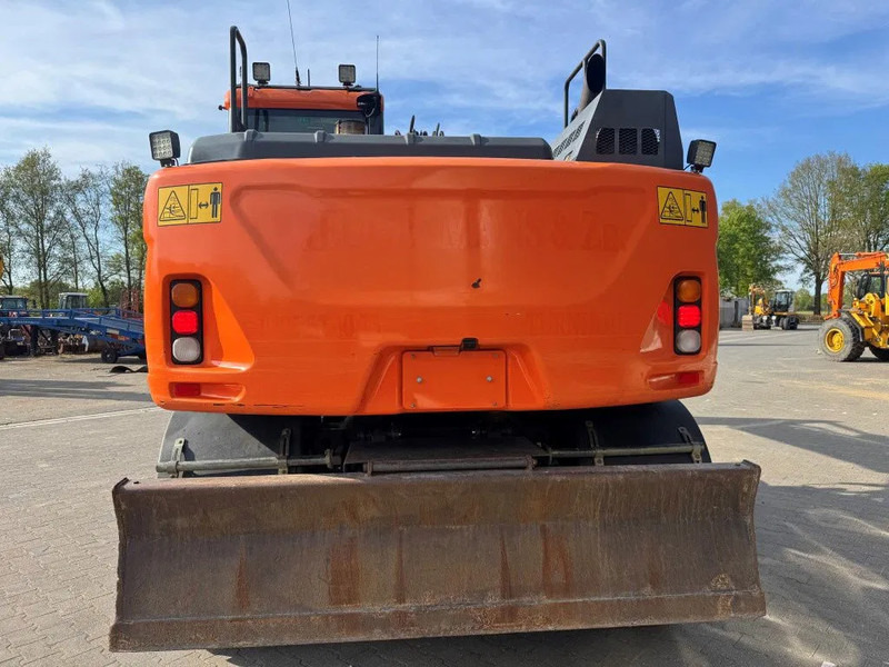 Doosan DX140-5 2018 - Ratinis ekskavatorius: foto 5 Doosan DX140-5 2018 - Ratinis ekskavatorius: foto 5