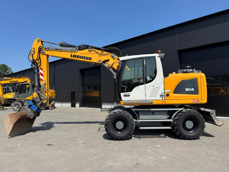 Liebherr A914 2019 7300 uur !! NL MACHINE !! - Ratinis ekskavatorius: foto 1 Liebherr A914 2019 7300 uur !! NL MACHINE !! - Ratinis ekskavatorius: foto 1