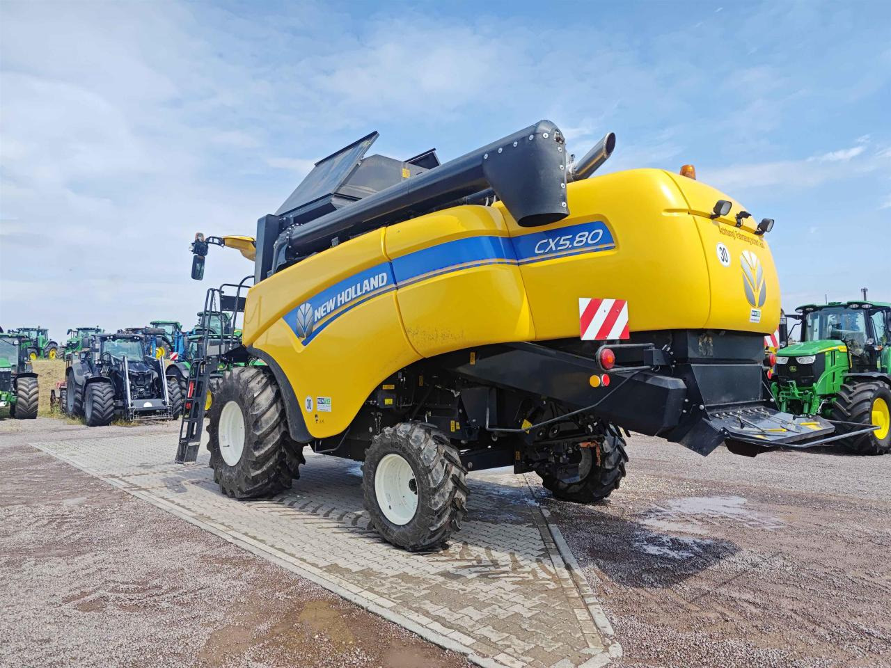 New Holland CX 5.80 - Derliaus nuėmimo kombainas: foto 4 New Holland CX 5.80 - Derliaus nuėmimo kombainas: foto 4