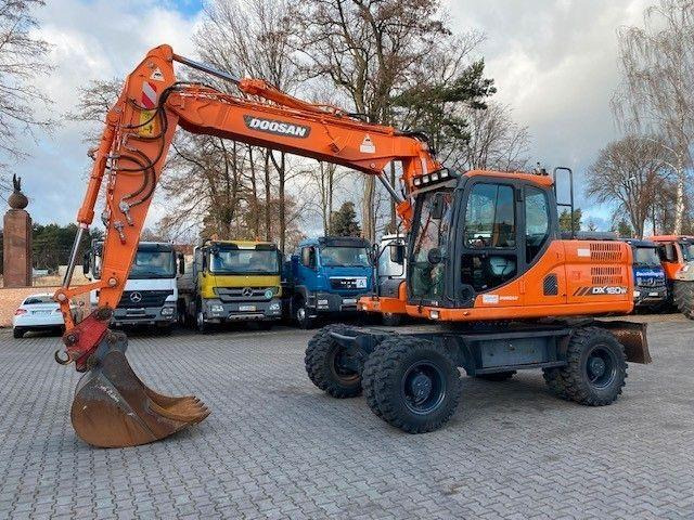 Doosan DX 160 W-3 - Ratinis ekskavatorius: foto 1 Doosan DX 160 W-3 - Ratinis ekskavatorius: foto 1