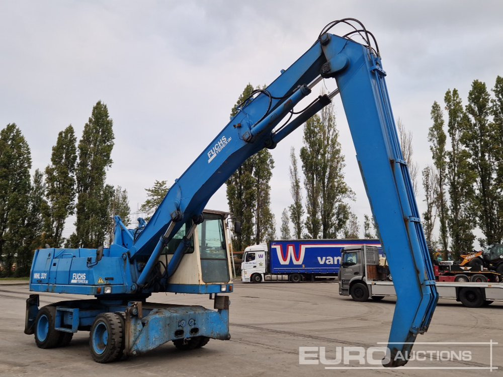 Ratinis ekskavatorius Fuchs MHL331: foto 7