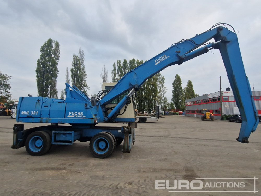 Ratinis ekskavatorius Fuchs MHL331: foto 6