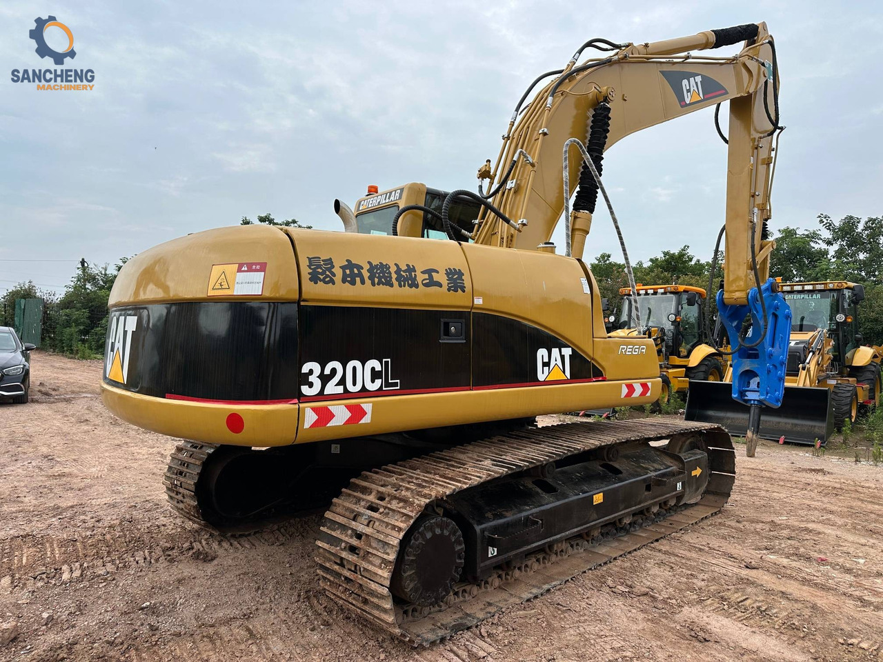CAT 320CL with hammer - Vikšrinis ekskavatorius: foto 4 CAT 320CL with hammer - Vikšrinis ekskavatorius: foto 4