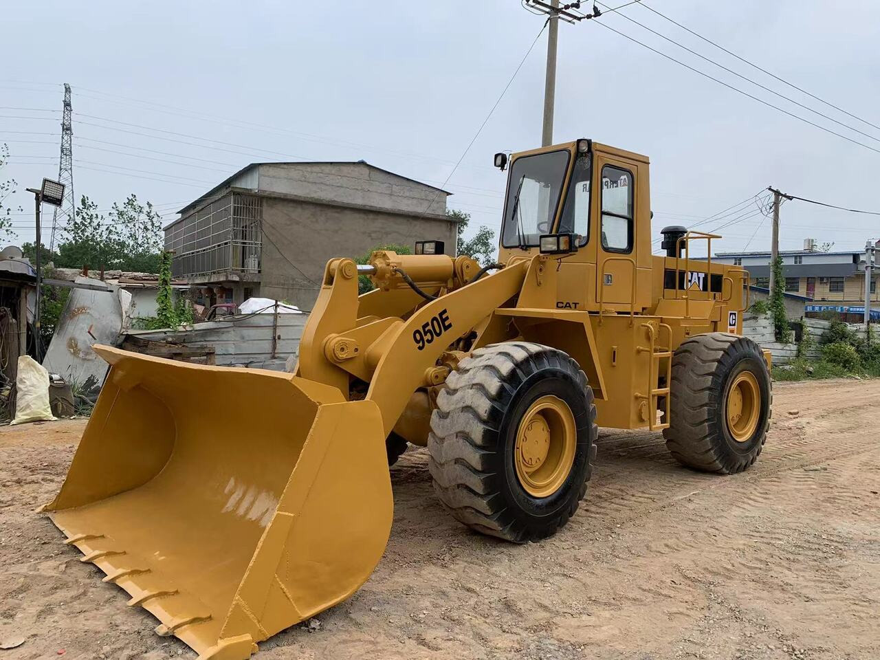 CATERPILLAR 950E - Ratinis krautuvas: foto 1 CATERPILLAR 950E - Ratinis krautuvas: foto 1