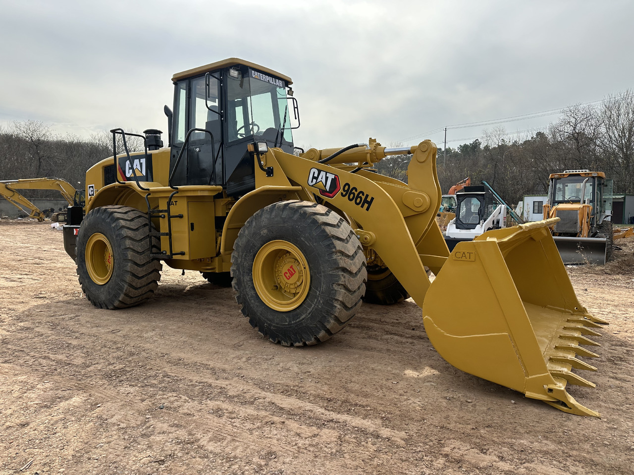 CATERPILLAR 966H - Ratinis krautuvas: foto 1 CATERPILLAR 966H - Ratinis krautuvas: foto 1