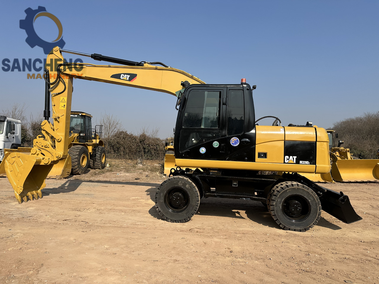 CATERPILLAR M320D2 - Ratinis ekskavatorius: foto 2 CATERPILLAR M320D2 - Ratinis ekskavatorius: foto 2