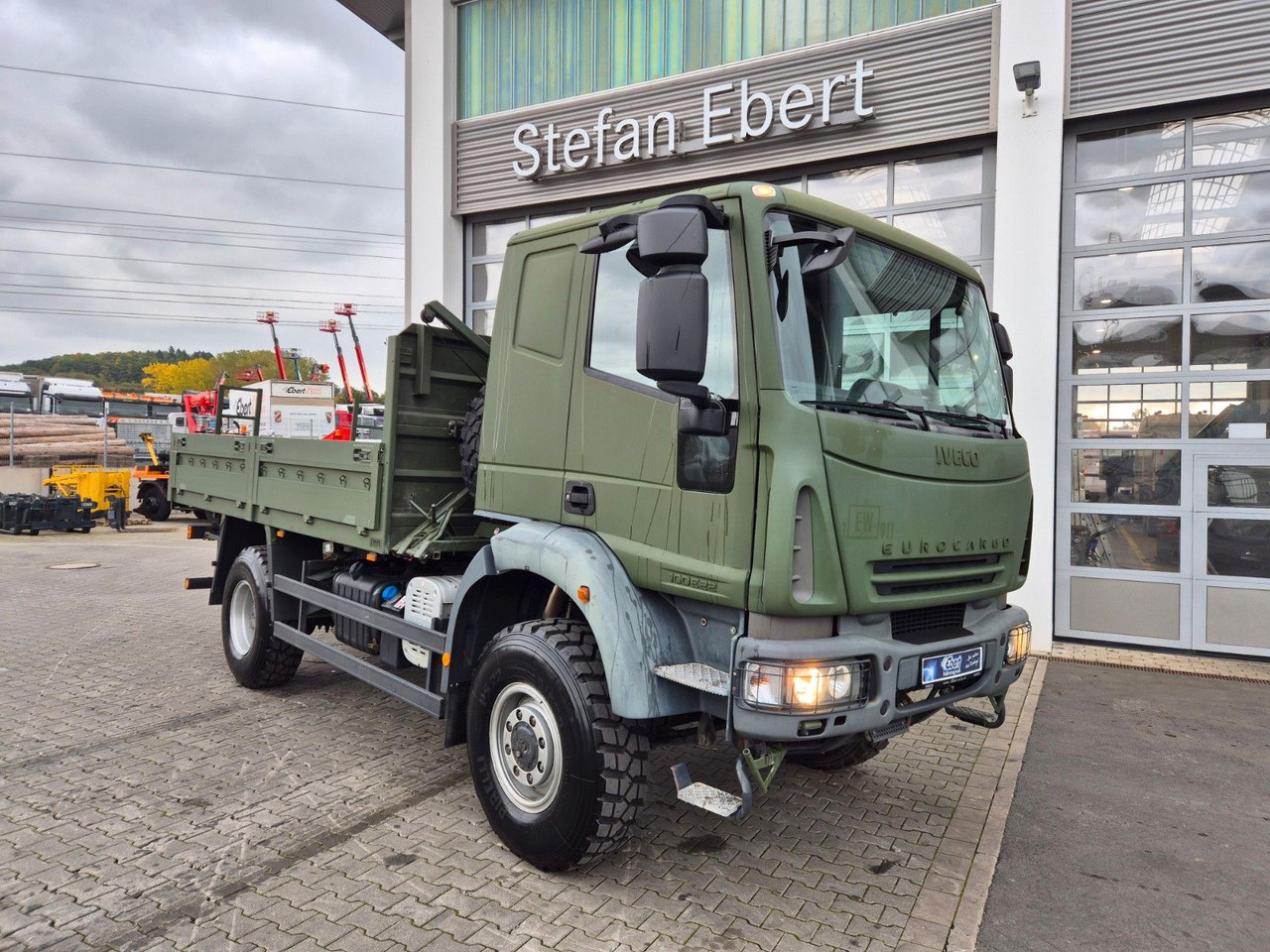Iveco Eurocargo ML100E22WM-BW 4x4 Pritsche L-Haus Bett - Platforminis/ Bortinis sunkvežimis: foto 2 Iveco Eurocargo ML100E22WM-BW 4x4 Pritsche L-Haus Bett - Platforminis/ Bortinis sunkvežimis: foto 2