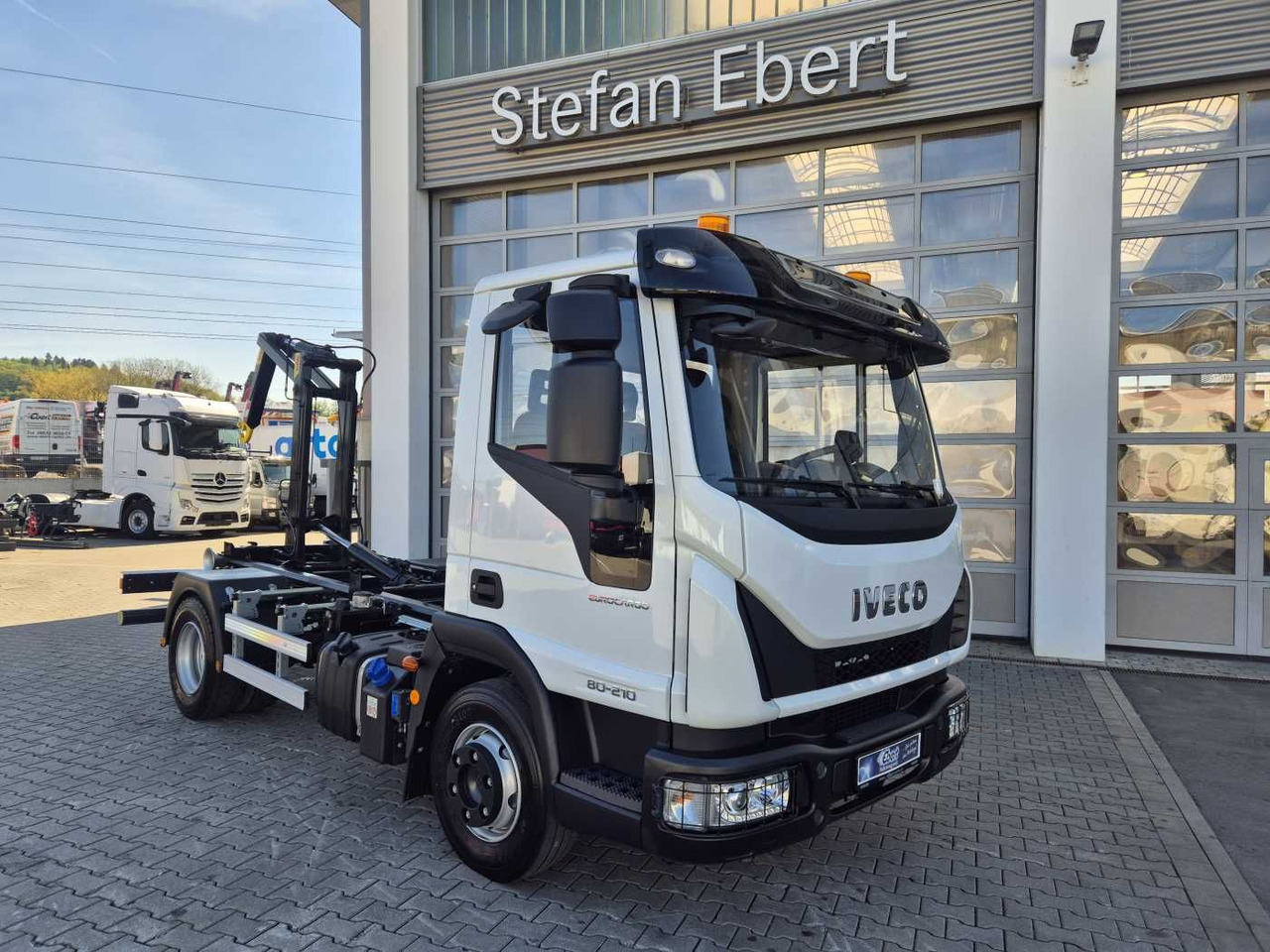 Iveco Eurocargo ML80E21K 4x2 Hyva 05-32-K-DIN-BF 2xAHK - Hook-lift sunkvežimis: foto 1 Iveco Eurocargo ML80E21K 4x2 Hyva 05-32-K-DIN-BF 2xAHK - Hook-lift sunkvežimis: foto 1