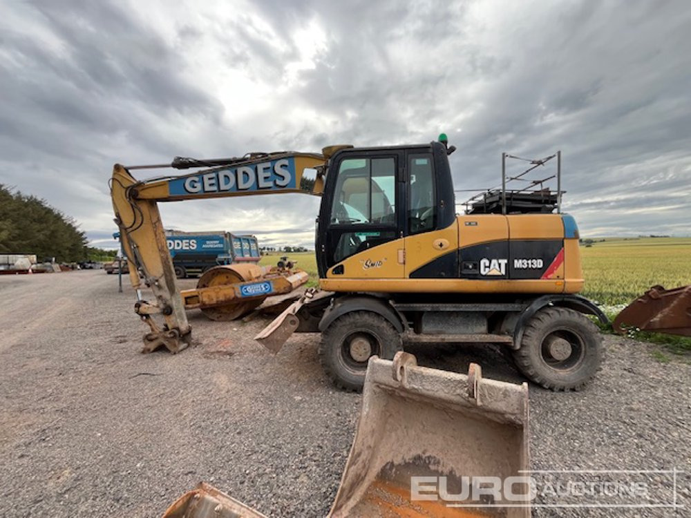 CAT M313D - Ratinis ekskavatorius: foto 2 CAT M313D - Ratinis ekskavatorius: foto 2