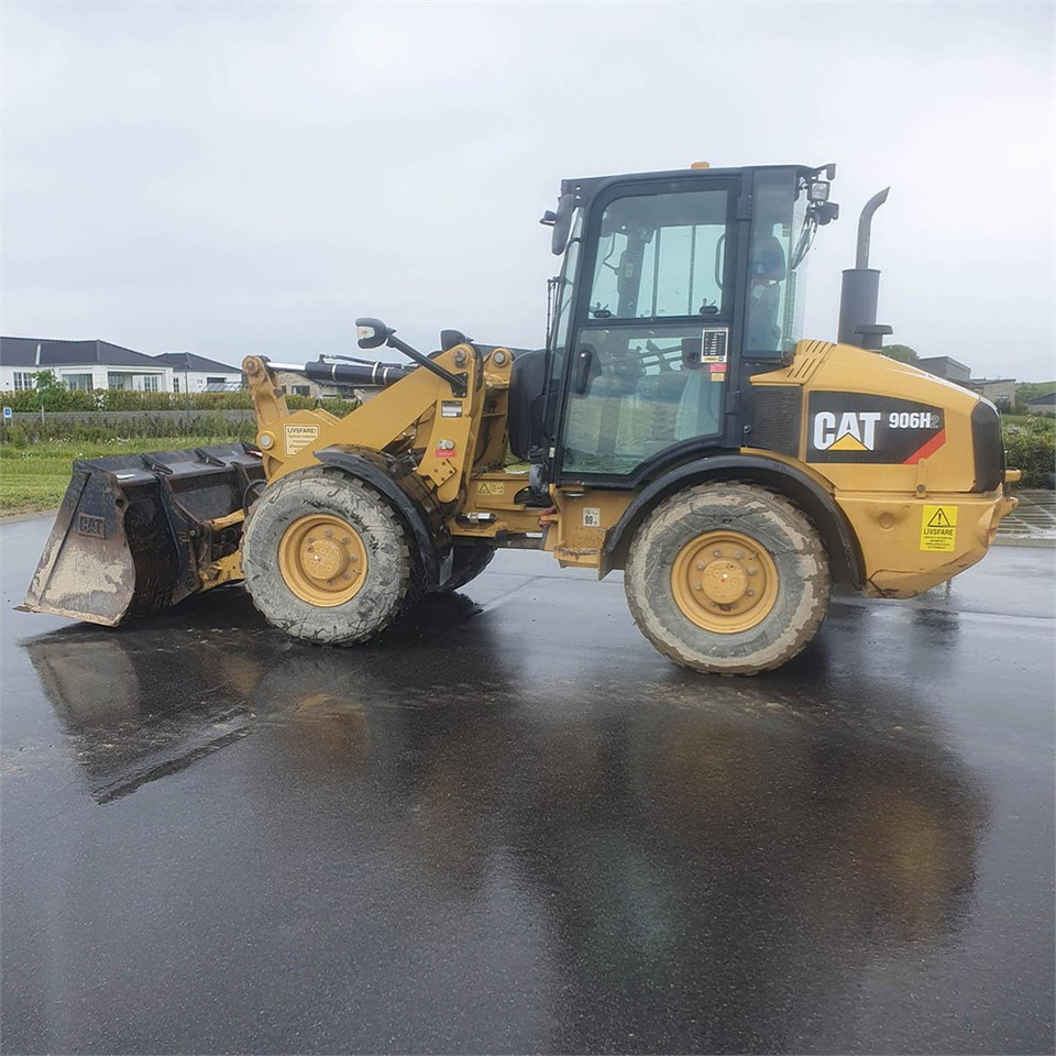 Caterpillar 906 H2 - Ratinis krautuvas: foto 1 Caterpillar 906 H2 - Ratinis krautuvas: foto 1