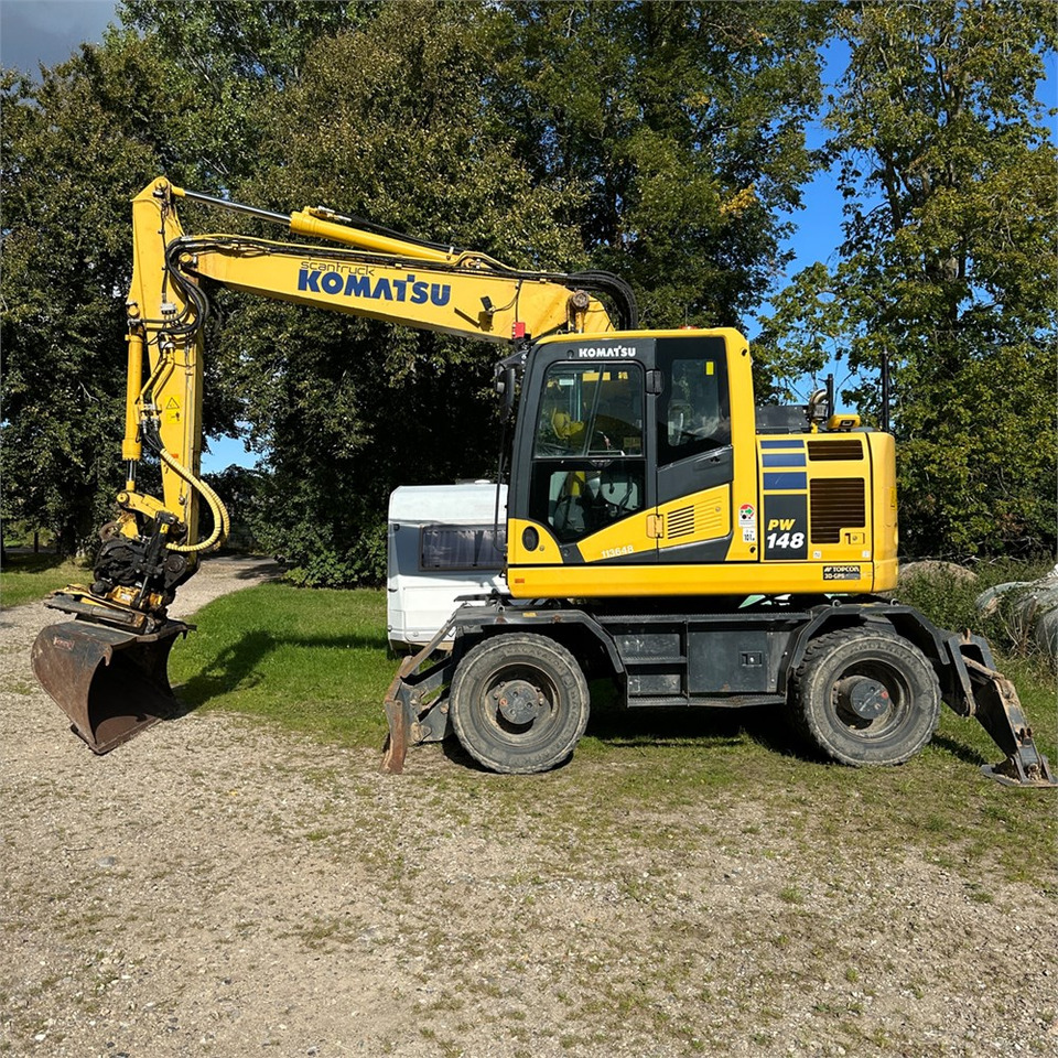 Komatsu PW148-11 - Ratinis ekskavatorius: foto 1 Komatsu PW148-11 - Ratinis ekskavatorius: foto 1