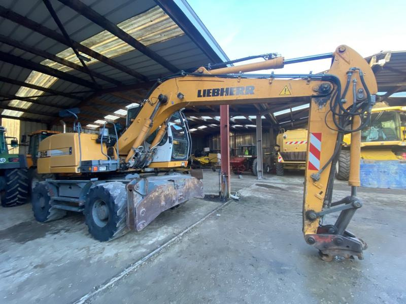 Liebherr A314 Litronic - Ratinis ekskavatorius: foto 1 Liebherr A314 Litronic - Ratinis ekskavatorius: foto 1