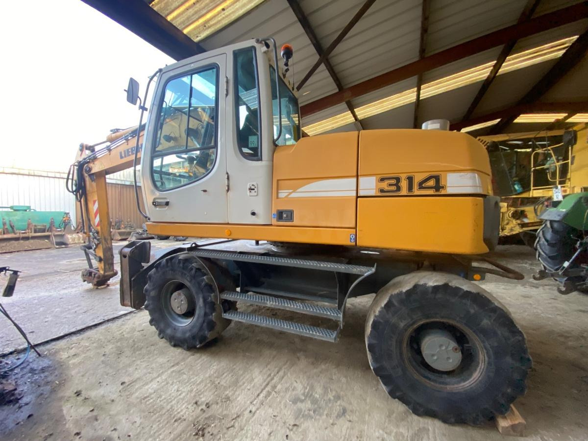 Liebherr A314 Litronic - Ratinis ekskavatorius: foto 4 Liebherr A314 Litronic - Ratinis ekskavatorius: foto 4
