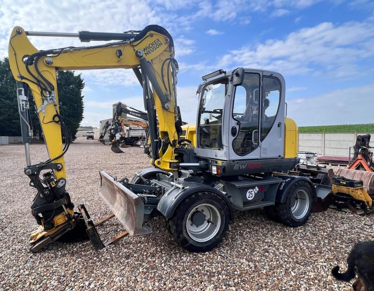Neuson EW 100 - Ratinis ekskavatorius: foto 1 Neuson EW 100 - Ratinis ekskavatorius: foto 1