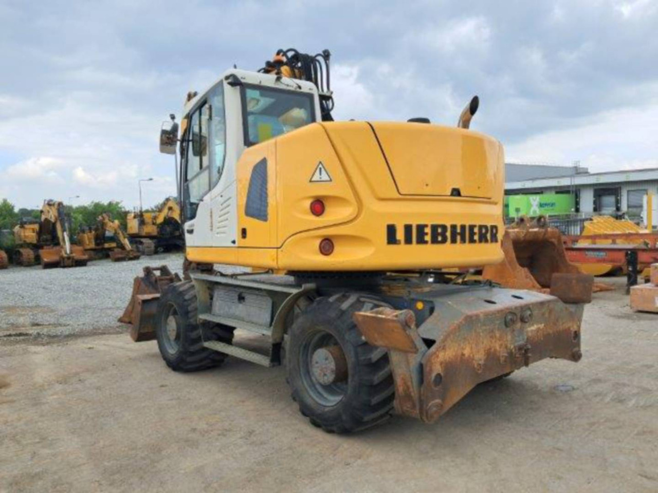 LIEBHERR A914 - Ratinis ekskavatorius: foto 1 LIEBHERR A914 - Ratinis ekskavatorius: foto 1