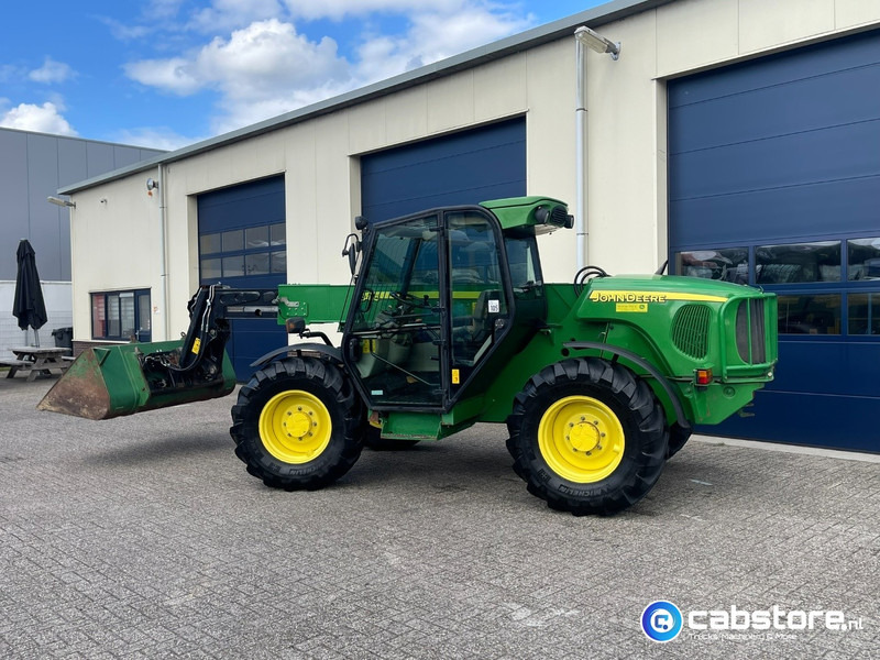John Deere 3415 Verreiker met vorken en laadschop - Žemės ūkio technika: foto 3 John Deere 3415 Verreiker met vorken en laadschop - Žemės ūkio technika: foto 3
