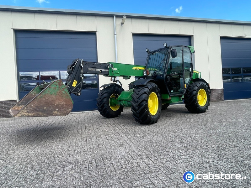 John Deere 3415 Verreiker met vorken en laadschop - Žemės ūkio technika: foto 4 John Deere 3415 Verreiker met vorken en laadschop - Žemės ūkio technika: foto 4