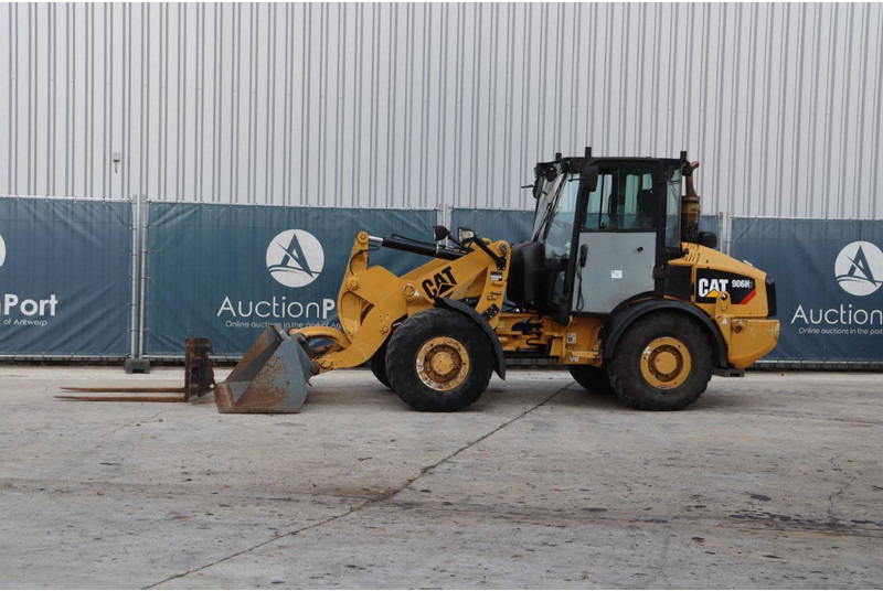 Caterpillar 906H2 - Ratinis krautuvas: foto 1 Caterpillar 906H2 - Ratinis krautuvas: foto 1